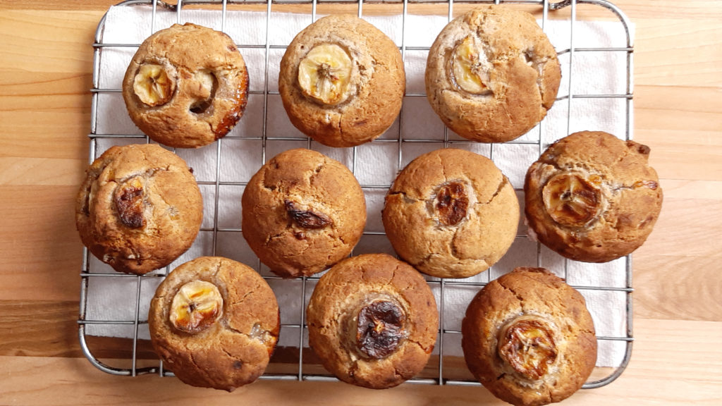 gluten free and vegan banana buckwheat muffins on a cooling rack