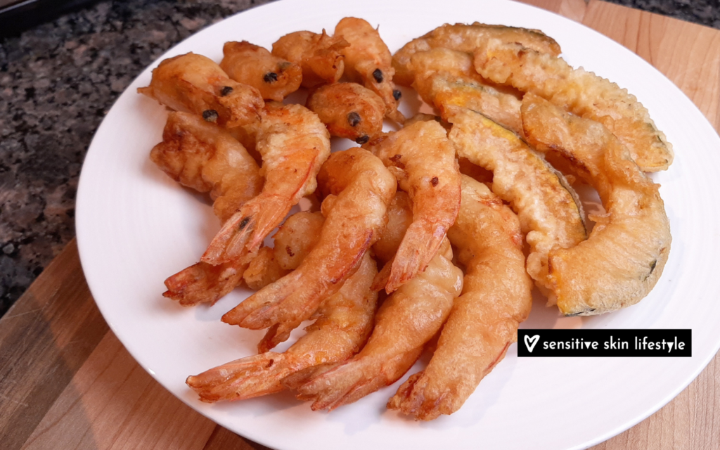 photo of a plate of golden crisp shrimp and kabocha tempura